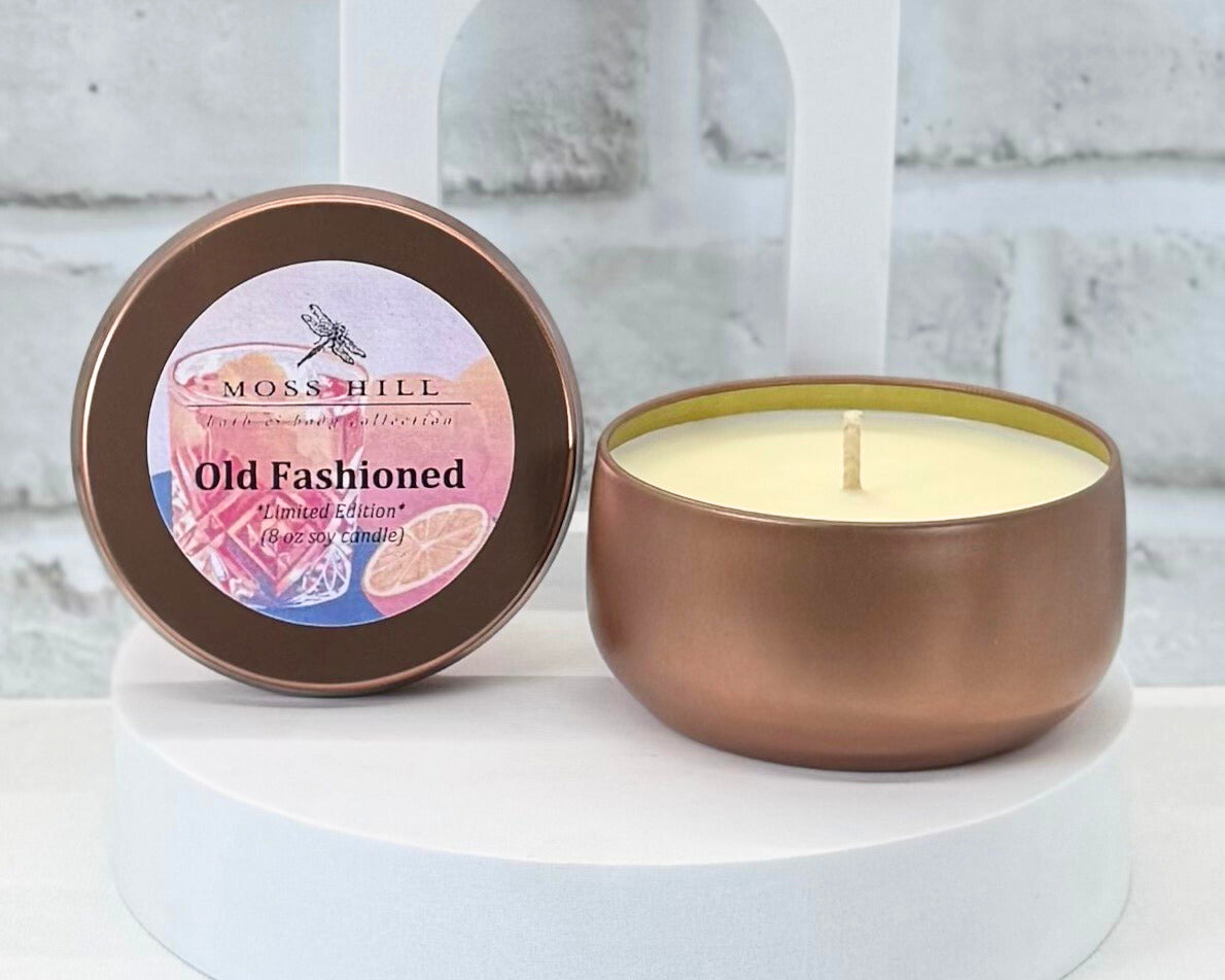 8 oz soy candle in the scent Mint Julep. Hand-poured into a gold container by Moss Hill Bath & Body.