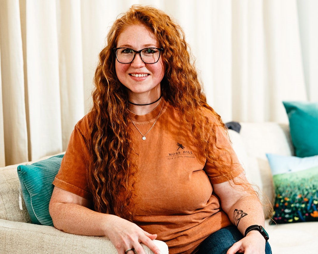 Image of Lyn, daughter in-law and operations lead at Moss Hill Bath & Body Collection, helping craft handmade bath and body essentials.