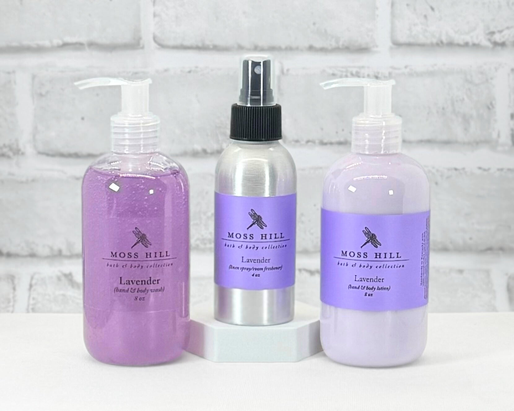 Luxurious handmade body wash, lotion, and linen spray packaged as a set