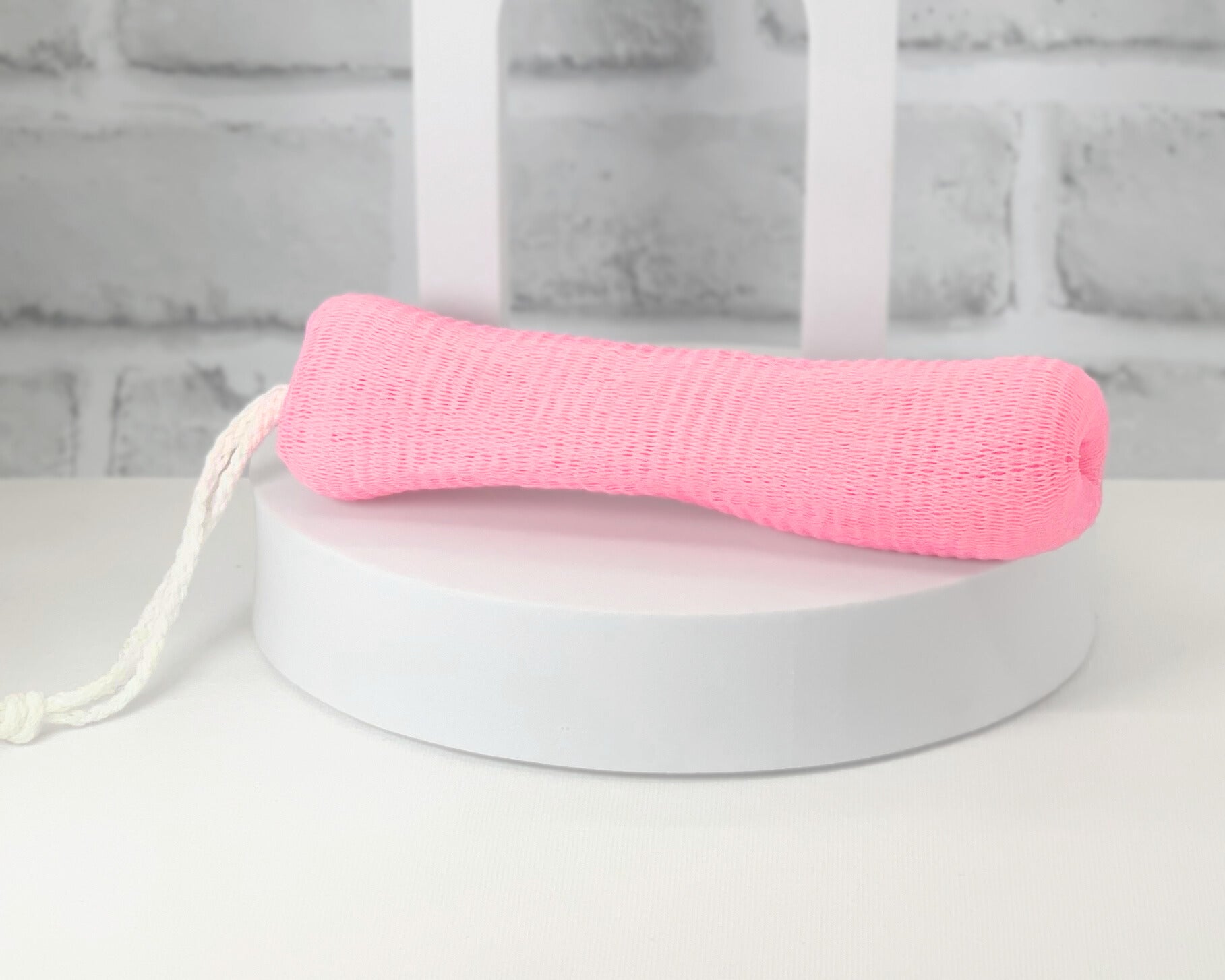 Exfoliating mesh loofah bag with drawstring closure