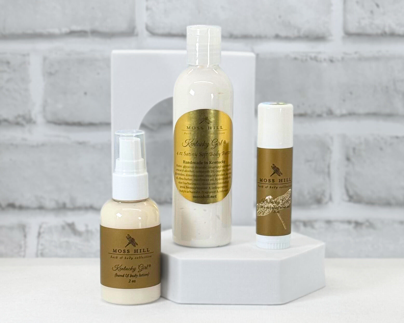 Kentucky Girl Moisturizing Gift Box Products. Labeled as hand and body lotion, body butter, and a moisturizing stick.