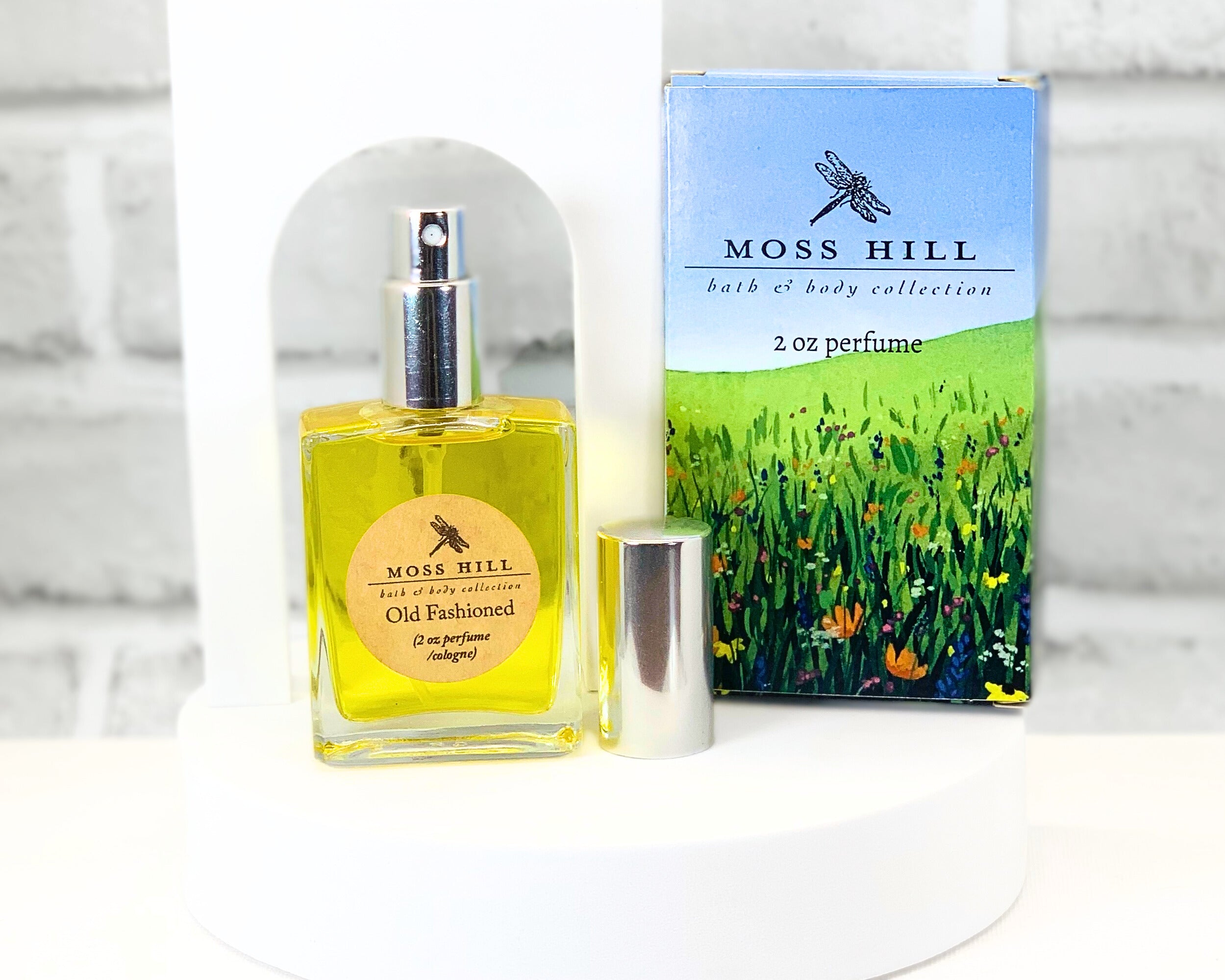 Elegant spray perfume in Old Fashioned scent in Moss Hill gift box displayed on white background