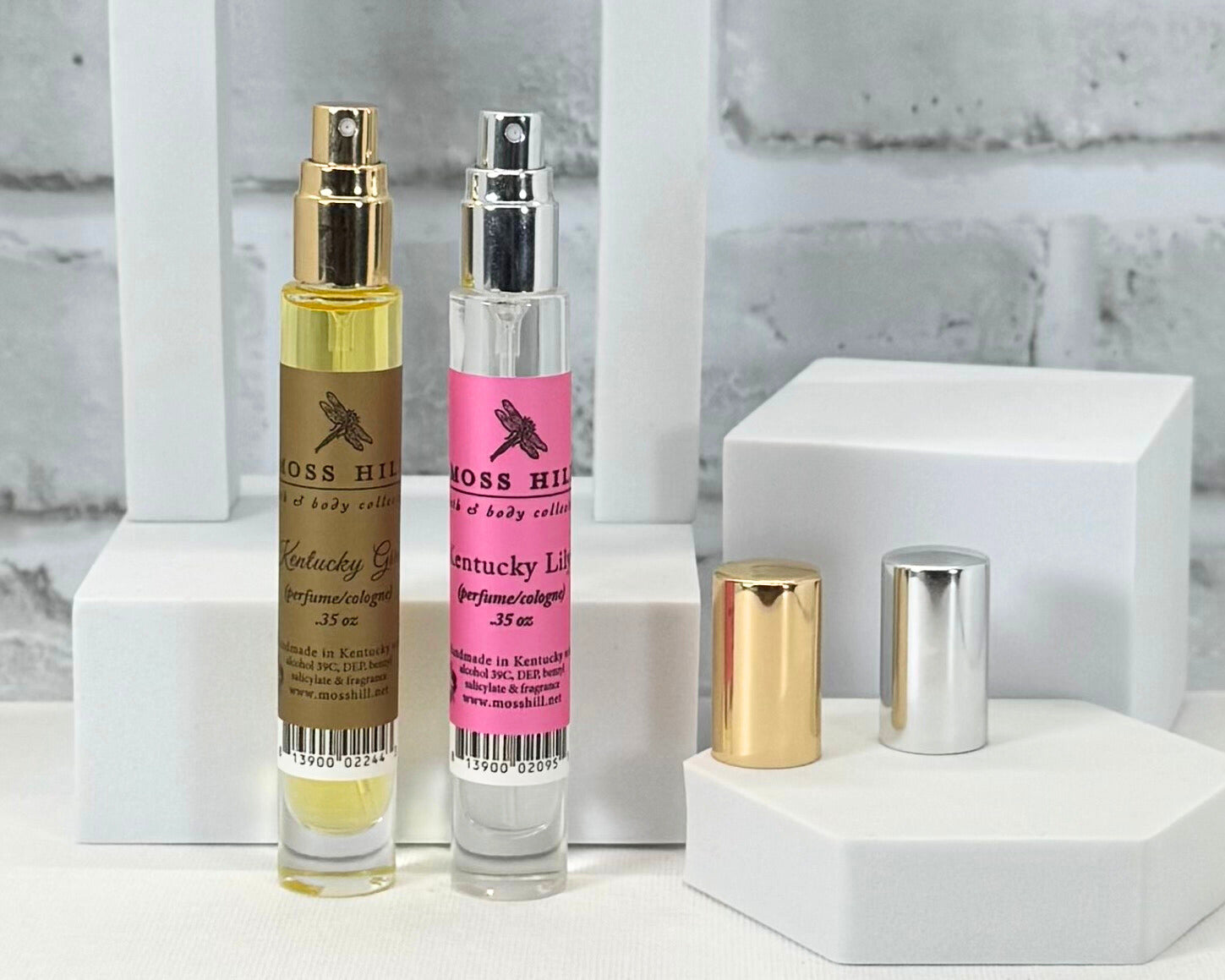 Travel-size perfume spritzer in two Moss Hill scents