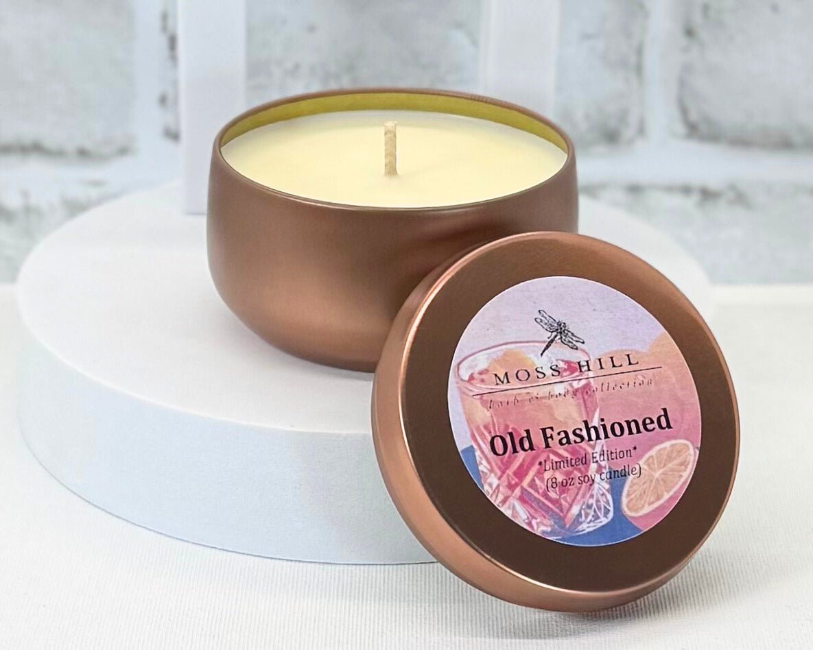 8 oz soy candle in the scent Old Fashioned Hand-poured into a silver container by Moss Hill Bath & Body.