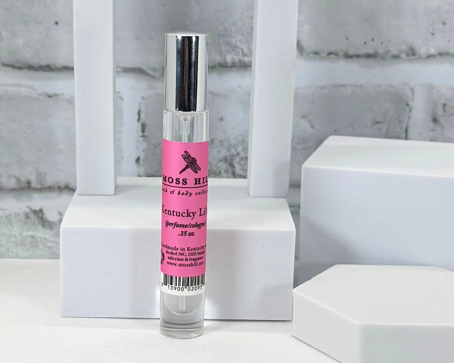 Handmade Kentucky Lilly perfume spray in a glass travel-size spritzer bottle.