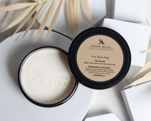 Shave soap in a black can with the moss hill logo that can be customized with your favorite scent.