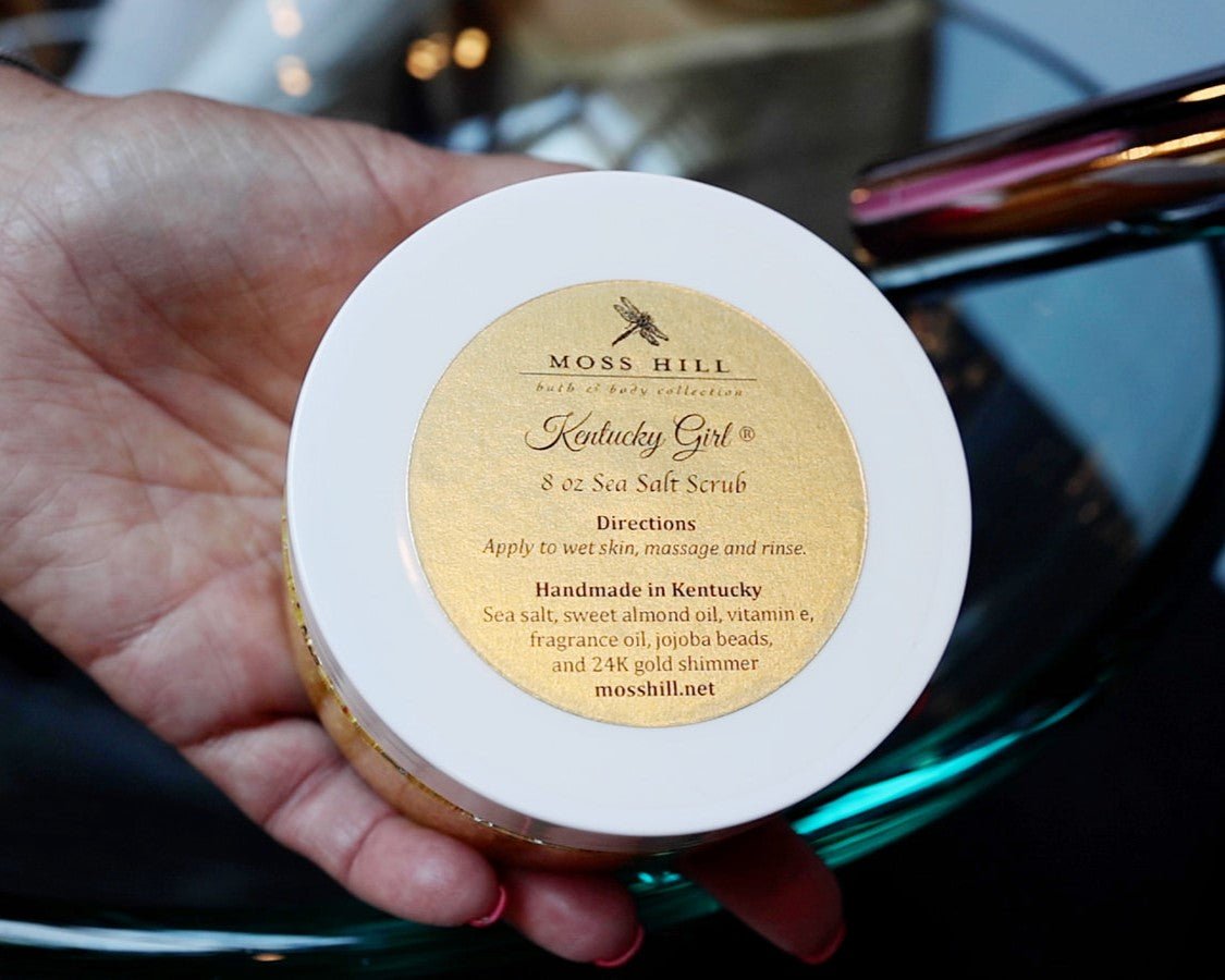 White lip top with gold Moss Hill label that says 8 oz Sea Salt Body Scrub Hand Made in Kentucky.