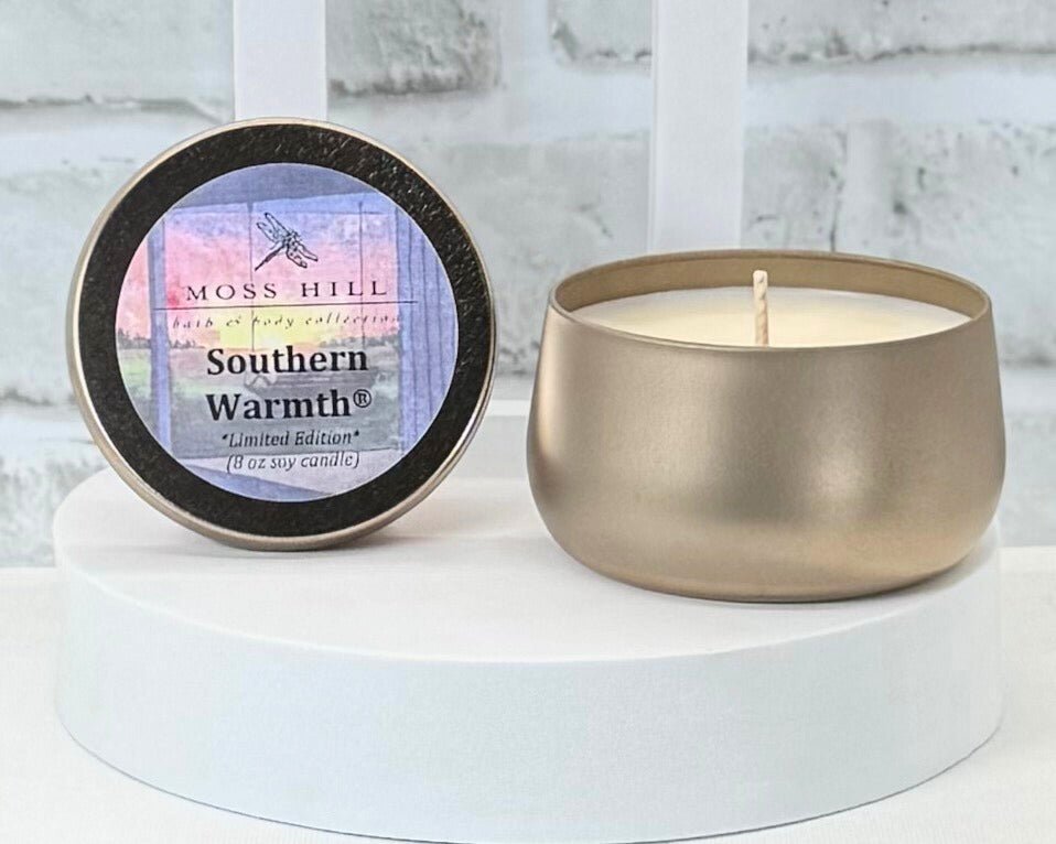 Moss Hill Southern Warmth 8oz soy candle with packaging on a white surface