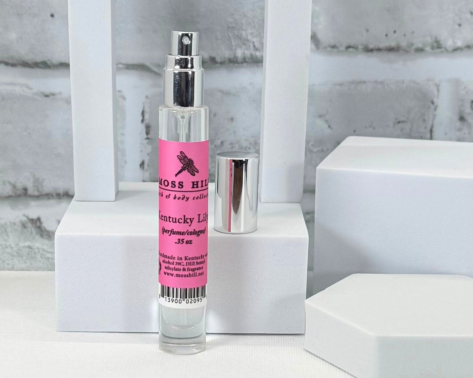 Compact perfume spray from Moss Hill in the signature Kentucky Lily Scent