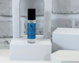 Roll-on perfume, Bluegrass scent by Moss Hill, in glass bottle with long-lasting fragrance base.