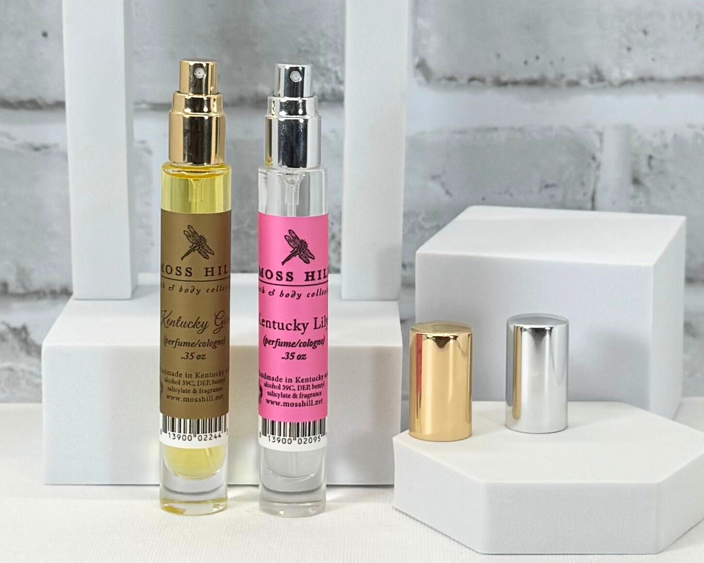 Travel-size perfume spritzer in two Moss Hill scents