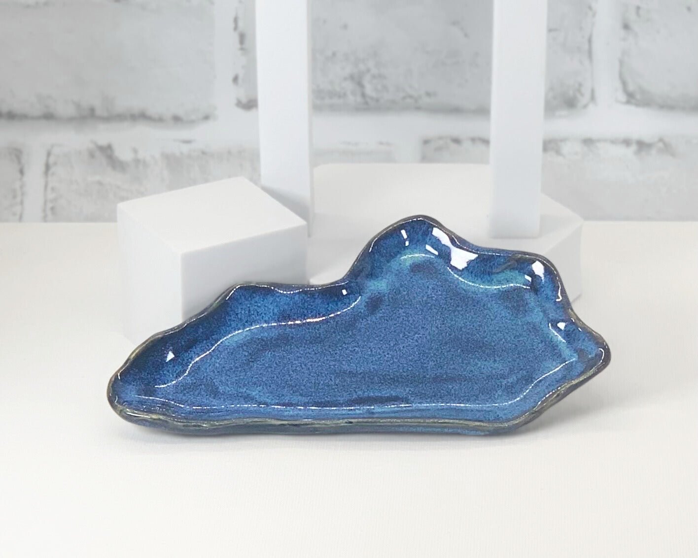 Blue custom made soap dish for high quality handmade soaps in the shape of Kentucky.