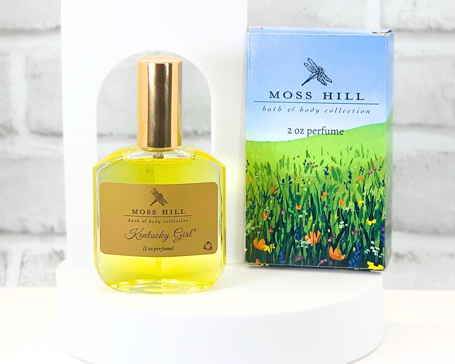 Elegant spray perfume in Kentucky Girl scent in Moss Hill gift box displayed on white background
