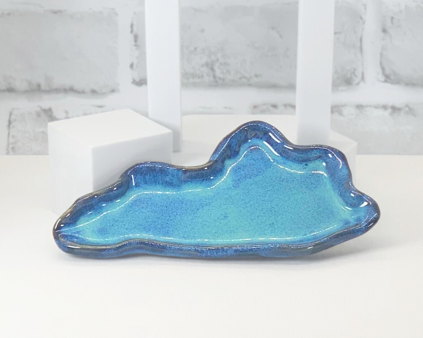 Light blue custom made soap dish for high quality handmade soaps in the shape of Kentucky.