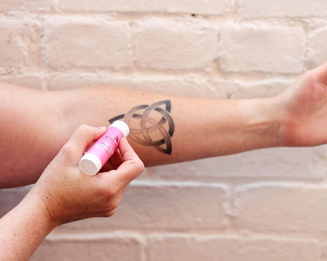 Video of the dry skin relief lotion bar being used on top of an arm tattoo for hydrating tattoo balm.