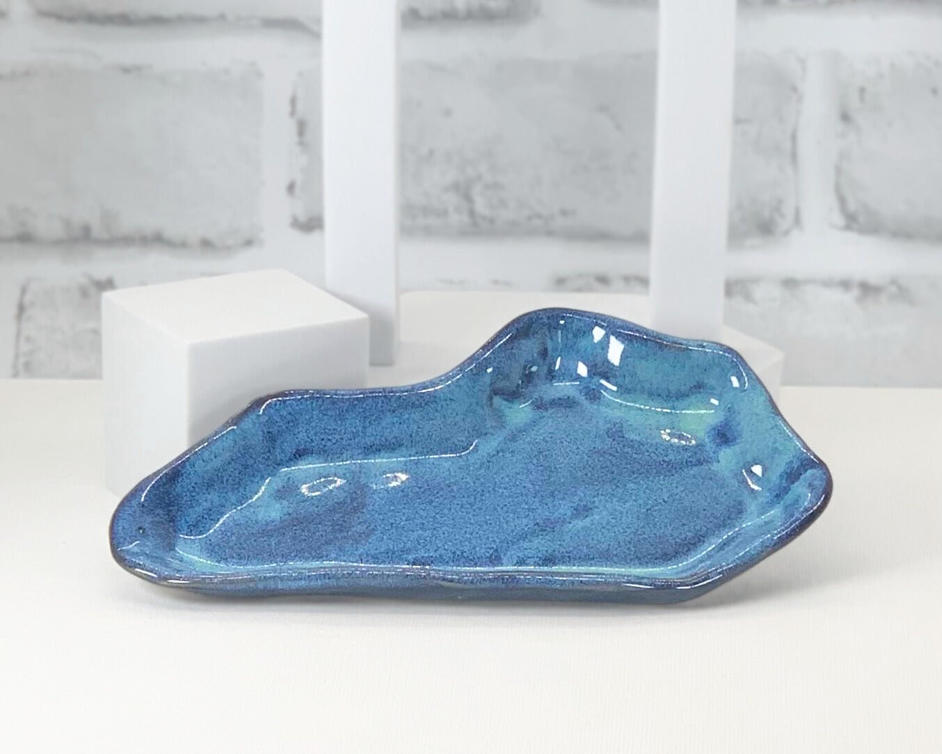 Custom made soap dish for high quality handmade soaps in the shape of Kentucky.